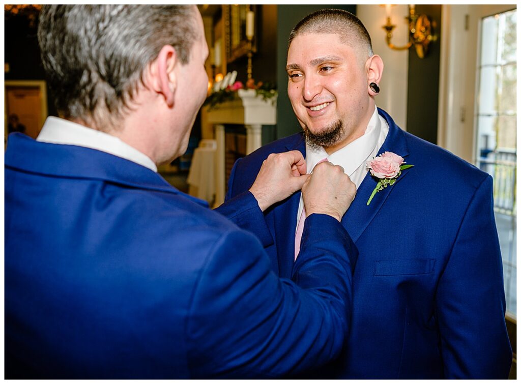 groom getting ready at Charter Oak Country Club