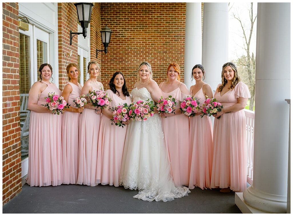 bride with bridesmaids at Charter Oak Country Club