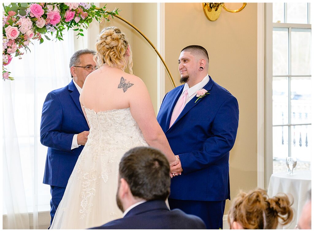 groom looking at bride at charter oak country club ceremony