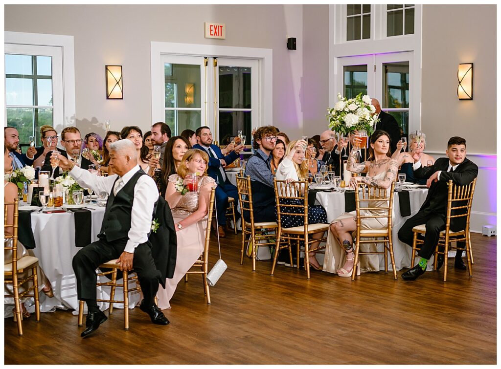 guests toasting at a Waverly Oaks Country Club wedding