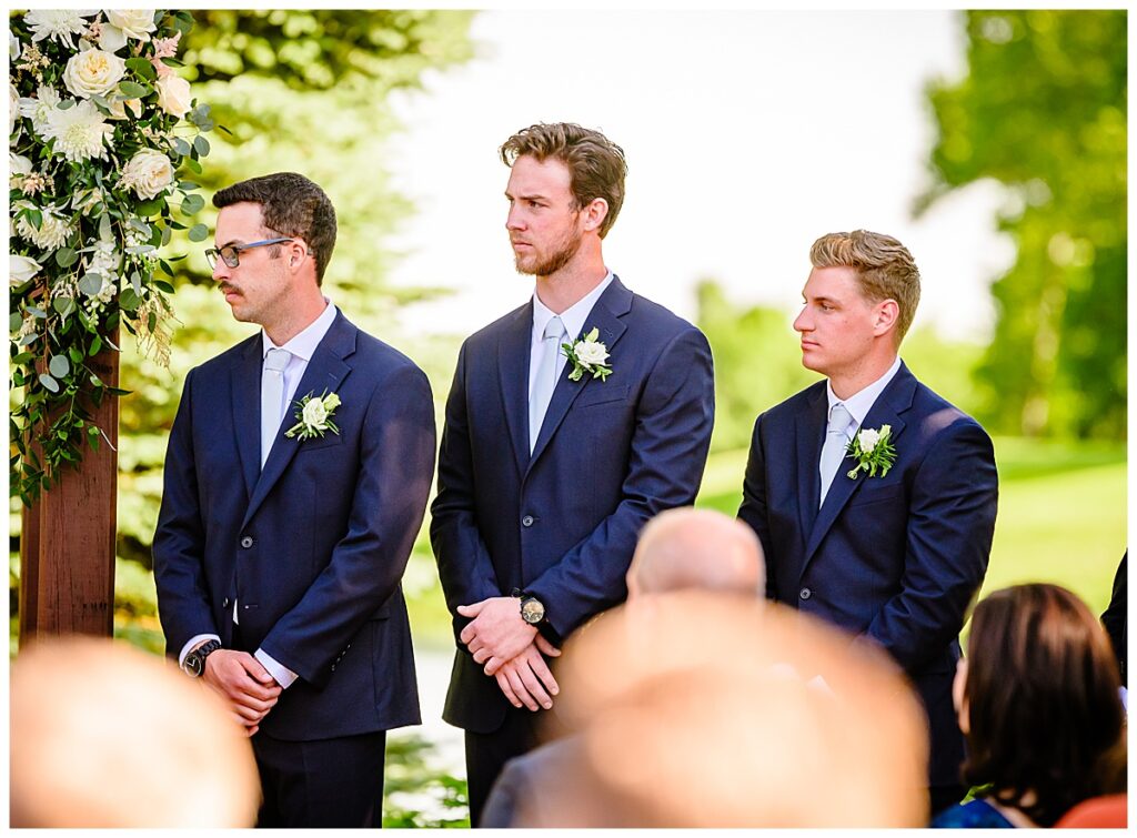 groomsmen during ceremony