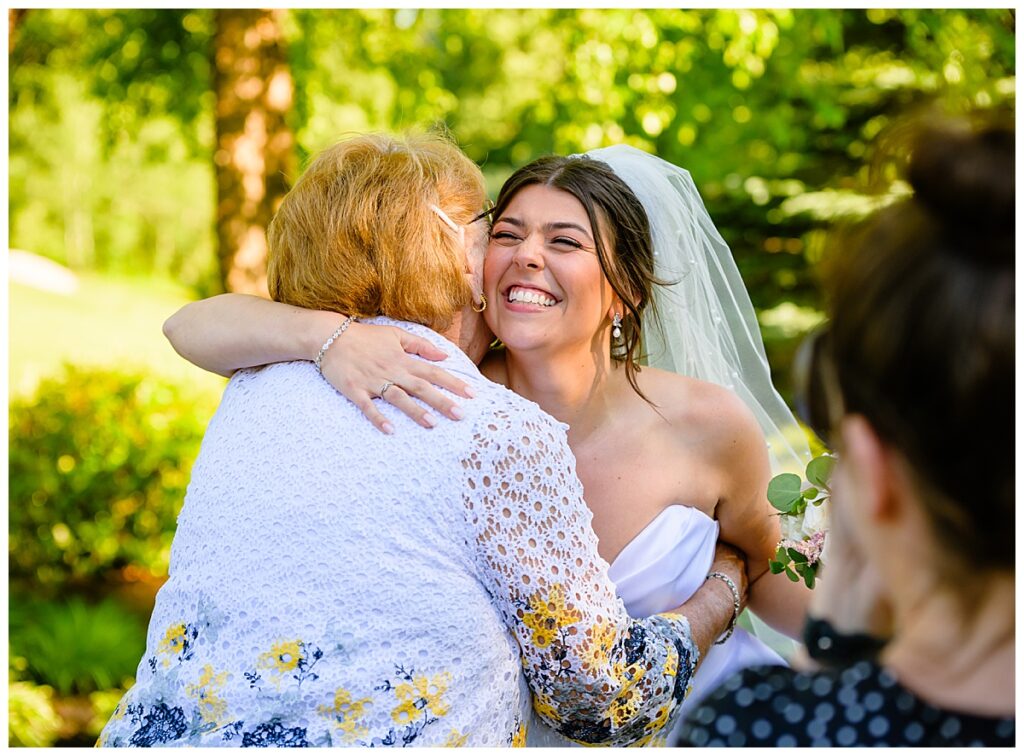 bride hugs grandmother