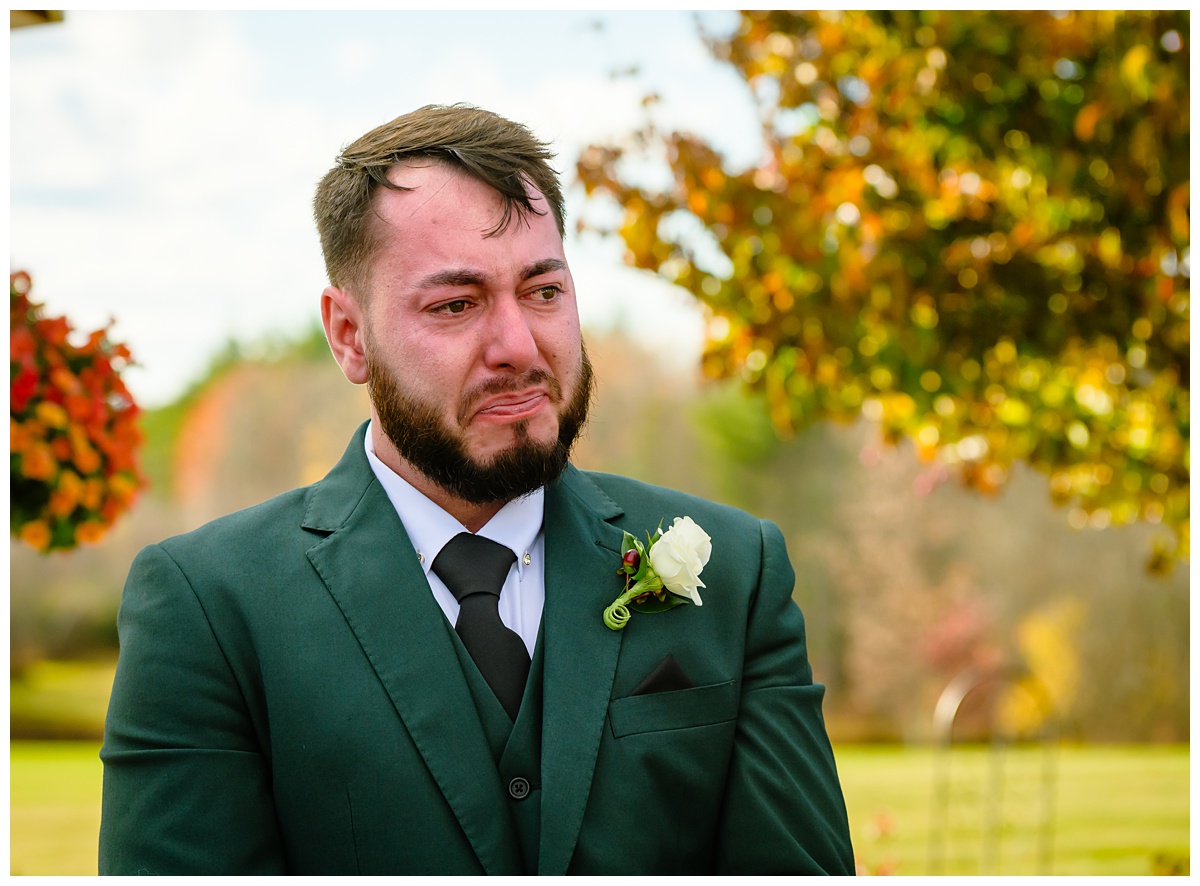 groom crying at ceremony at dell-lea