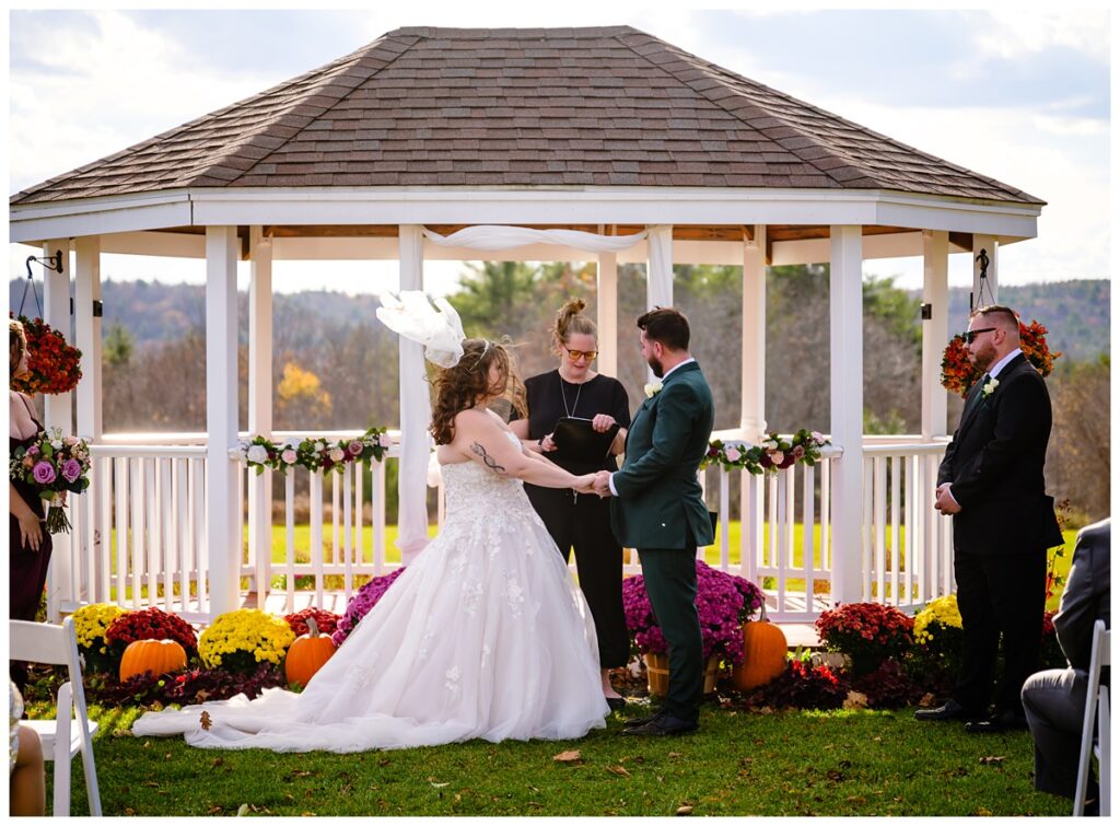 wind blowing veil at ceremony at Dell-Lea Weddings & Events