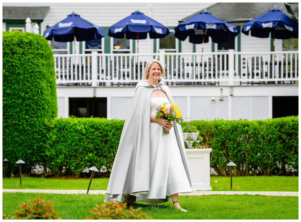 bride to walking down isle at Sagamore Inn, cape cod elopement