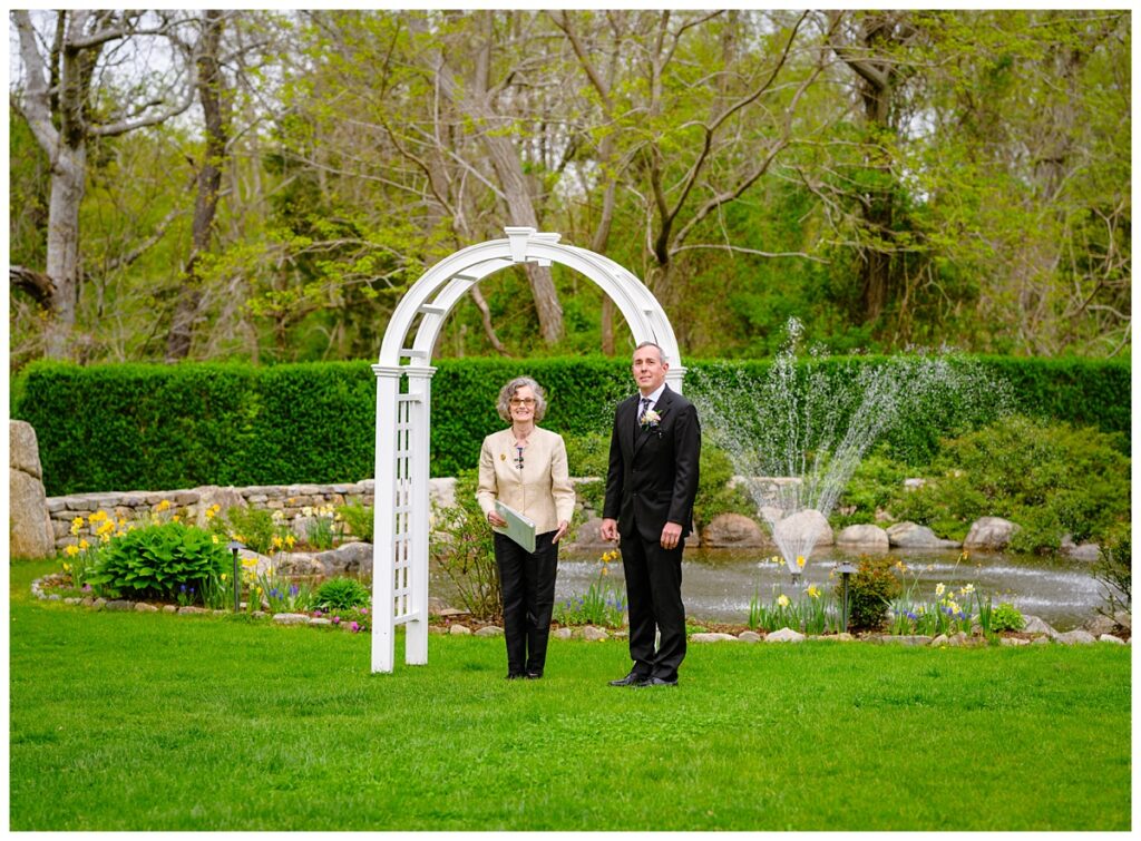 groom waiting for bride to walk down isle at cape cod elopement