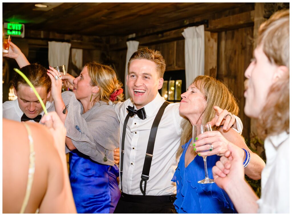 groom dancing at barn on the pemi