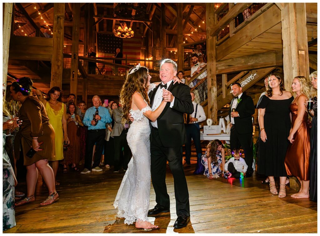 bride dancing with dad at barn on the pemi wedding