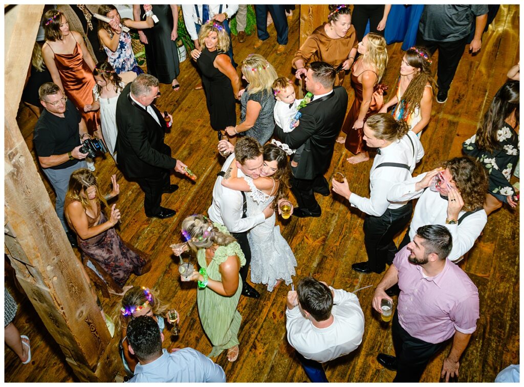 packed dance floor at barn on the pemi wedding