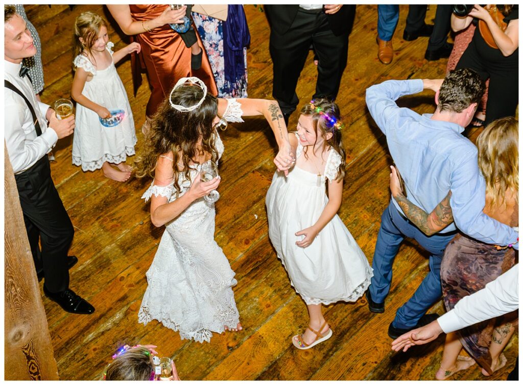 packed dance floor at barn on the pemi wedding