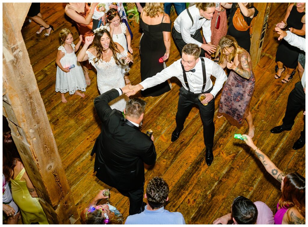 packed dance floor at barn on the pemi wedding