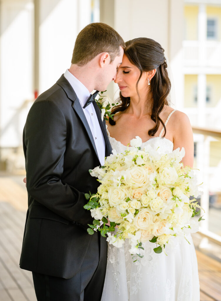 Harding Allen Estate wedding with couple touching foreheads before ceremony